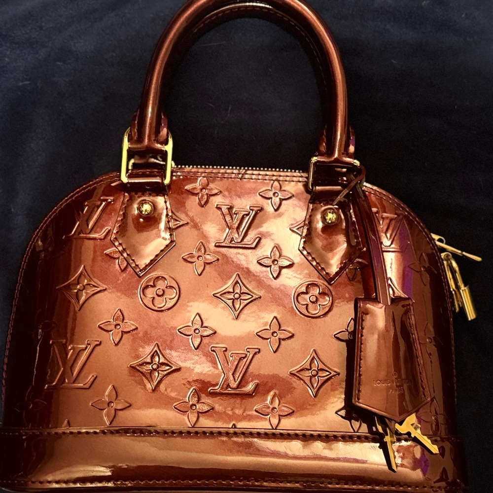 Louis Vuitton burgundy Mini Bag with Monogram Pattern and Gold Hardware